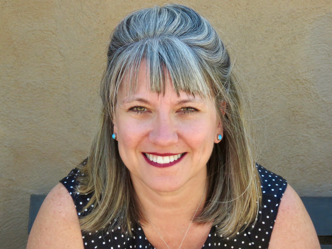 Portrait of Carol Grubbe, team building facilitator. Trainer. Carol Grubbe, LLC.